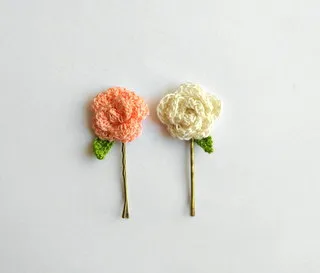 coral and white pins
