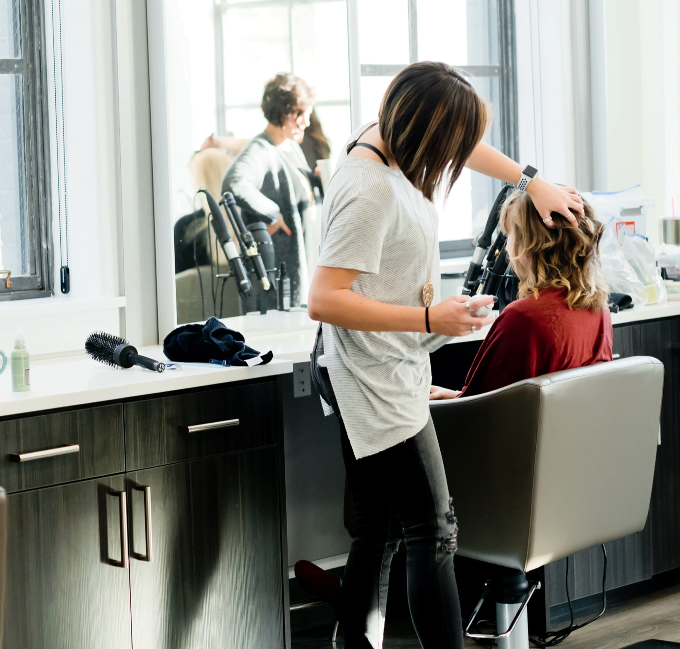 Megan Mathers Hair Stylist Cutting hair